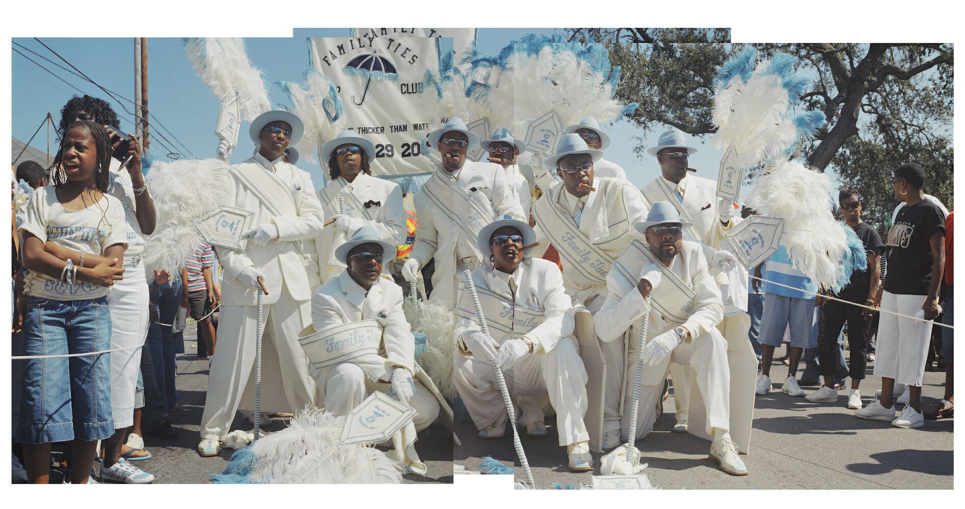 artwork showing a group of people in suits