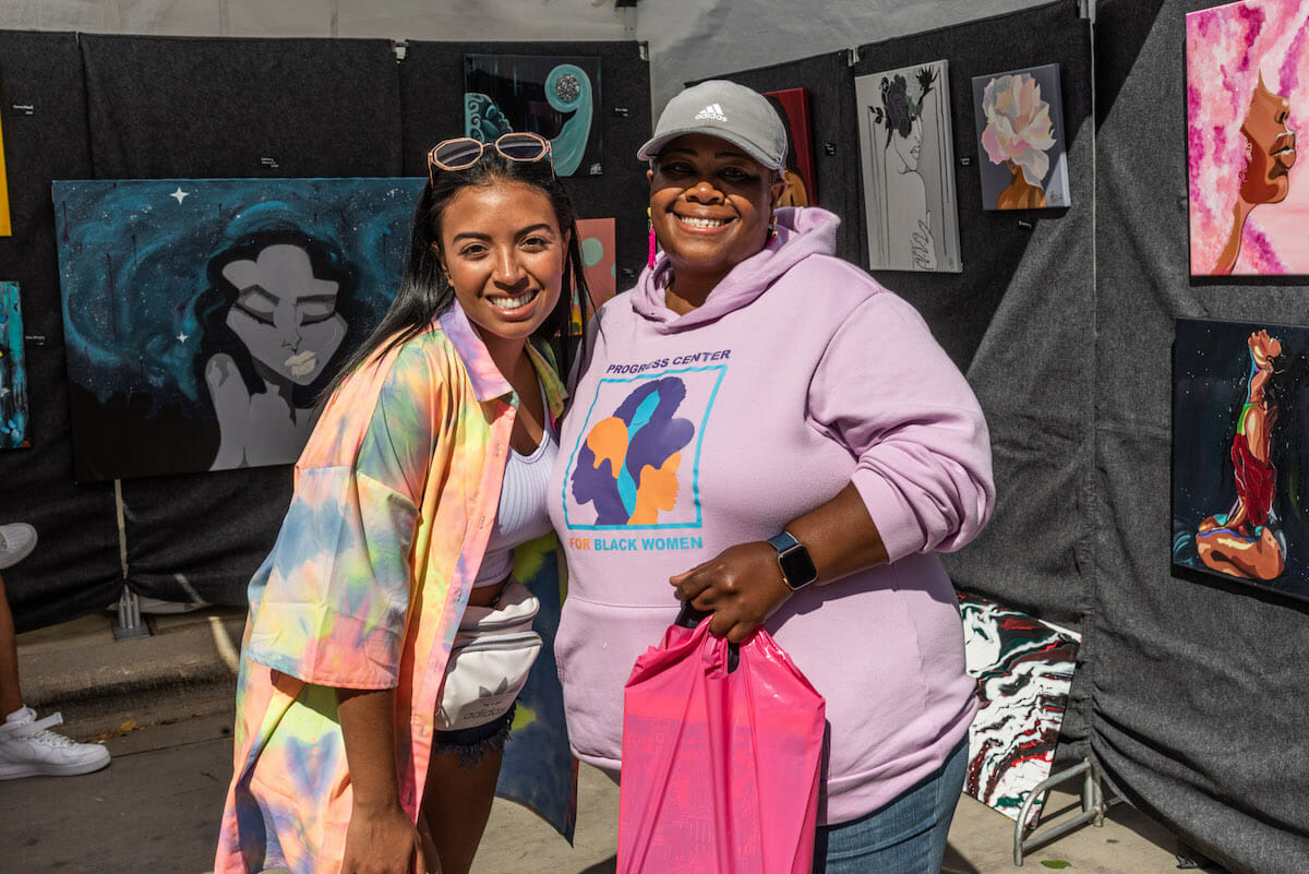 two people at Art Fair on the Square