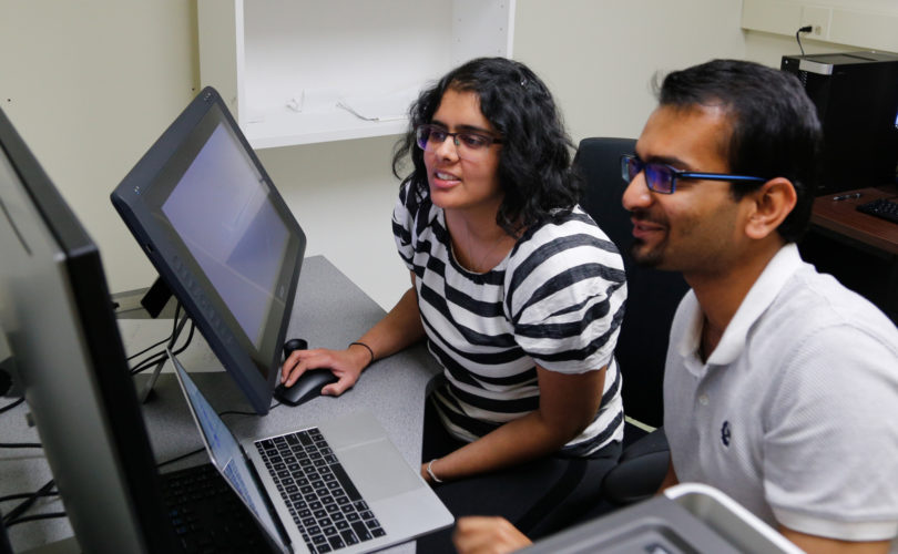 Hoon Lab researchers at computer