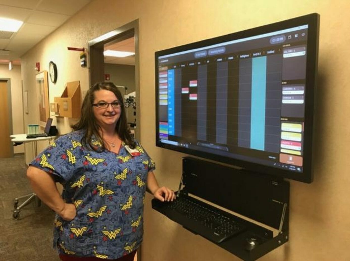 Darla Coullard, ophthalmic assistant, using the eSynchrony board.
